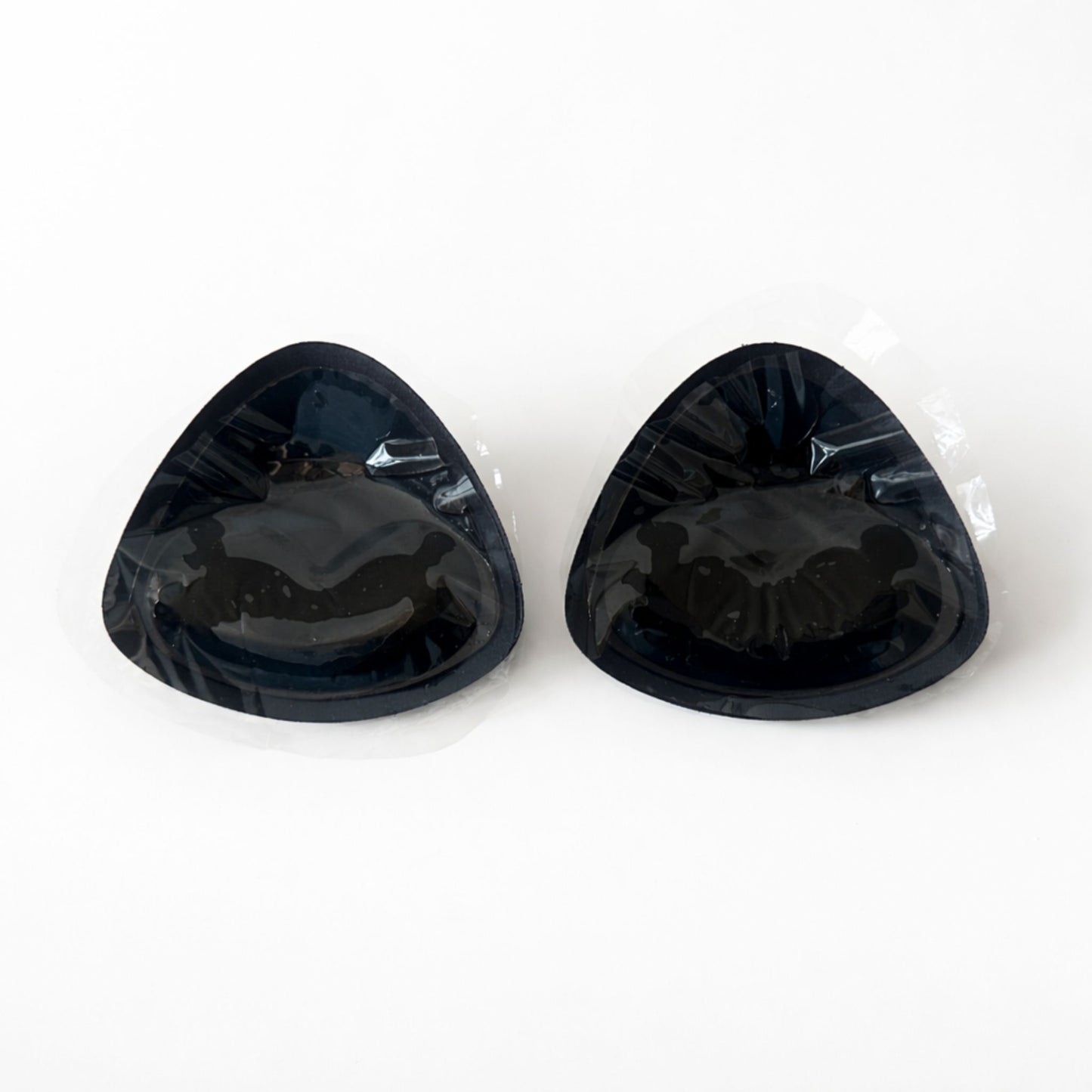 двойнозалепващи подплънки – снимка на лепящия слой и защитното фолио